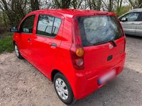Gebraucht Daihatsu Cuore 69 PS (50 kW) 2011 Rot Kleinwagen