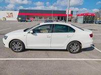 Second-hand VW Jetta Highline 122 CP (89 kW) 2012 Alb Berlinǎ