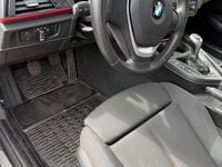 Second-hand BMW 116 Shadowline 2012 Roșu Hatchback