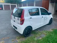Gebraucht Daihatsu Cuore 70 PS (51 kW) 2010 Weiß Kleinwagen
