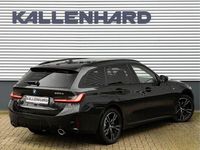 Gebraucht BMW 330e Performance 292 PS (214 kW) 2024 Blacksapphire metallic (475) Kombi