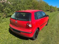 Second-hand VW Polo 75 CP (55 kW) 2003 Roșu Hatchback