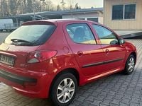 Gebraucht Peugeot 206+ 75 PS (55 kW) 2010 Rot Kleinwagen
