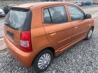Second-hand Kia Picanto 55 CP (40 kW) 2006 Portocaliu Hatchback