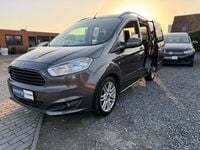 Gebraucht Ford Tourneo Courier Titanium 101 PS (74 kW) 2018 Magneticgrau (metallic) Van / Kleinbus