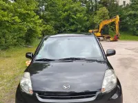 Gebraucht Daihatsu Sirion 91 PS (66 kW) 2008 Schwarz Kleinwagen