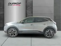 Gebraucht Opel Mokka Ultimate 131 PS (96 kW) 2022 Kontrast grau/quarz silber (metallic) SUV
