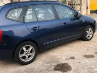 Gebraucht Kia Carens 140 PS (102 kW) 2009 Blau Van / Kleinbus