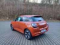 Gebraucht Suzuki Swift Comfort+ 83 PS (61 kW) 2026 Flame orange met Kleinwagen