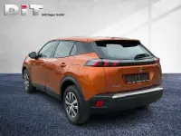 Second-hand Peugeot e-2008 Active 100 kW (136 CP) 2022 Portocaliu SUV