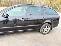 Second-hand Skoda Octavia 105 CP (77 kW) 2013 Negru Break