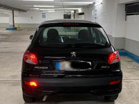 Gebraucht Peugeot 206+ 73 PS (53 kW) 2012 Schwarz Kleinwagen