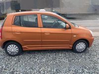 Second-hand Kia Picanto 55 CP (40 kW) 2006 Portocaliu Hatchback