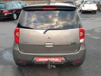 Gebraucht Mitsubishi Colt Motion 95 PS (69 kW) 2012 Braun Kleinwagen