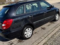 Second-hand Skoda Fabia 80 CP (58 kW) 2010 Negru Break