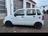 Używany Opel Agila 60 KM (44 kW) 2007 Biały Sedan/Limuzyna