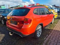 Second-hand BMW X1 Performance 218 CP (160 kW) 2015 Portocaliu SUV