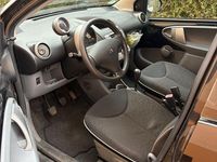 Gebraucht Peugeot 107 Filou 68 PS (50 kW) 2009 Schwarz Kleinwagen