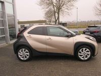 Gebraucht Toyota Aygo X Pulse 72 PS (52 kW) 2022 Ginger beige metallic/ night sky black SUV