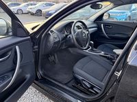 Second-hand BMW 116 Advantage 122 CP (89 kW) 2009 Negru Hatchback