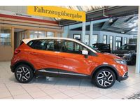 Gebraucht Renault Captur Luxe 90 PS (66 kW) 2013 Orange enz + elfenbeinfarben d16 (metallic) SUV