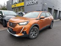 Gebraucht Peugeot e-2008 Active 100 kW (136 PS) 2021 Lackierung orange fusion/typ aussenverkleidung metalliclackierung SUV