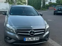 Używany Mercedes A180 129 KM (94 kW) 2012 Szary Sedan/Limuzyna