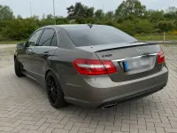 Używany Mercedes E500 408 KM (300 kW) 2011 Brązowy Sedan/Limuzyna