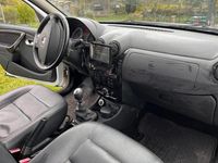 Second-hand Dacia Duster 110 CP (80 kW) 2011 Alb SUV