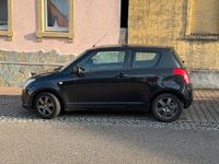 Gebraucht Suzuki Swift 90 PS (66 kW) 2010 Schwarz Kleinwagen