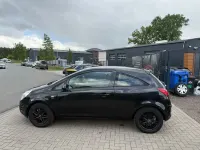Gebraucht Opel Corsa Active 69 PS (50 kW) 2013 Schwarz Kleinwagen