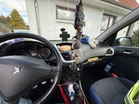 Gebraucht Peugeot 206 70 PS (51 kW) 2012 Grau Kleinwagen