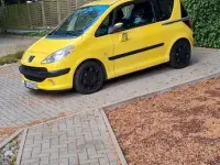 Gebraucht Peugeot 1007 Tendance 73 PS (53 kW) 2007 Gelb Van / Kleinbus