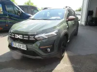 Gebraucht Dacia Sandero Extreme 91 PS (66 kW) 2024 Safarigrüngrau metallic Kleinwagen