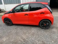 Gebraucht Toyota Aygo 70 PS (51 kW) 2014 Orange Kleinwagen