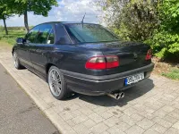 Second-hand Opel Omega 211 CP (155 kW) 1997 Negru Berlinǎ