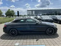 Gebraucht Mercedes C180 AMG 156 PS (114 kW) 2023 Schwarz Cabrio