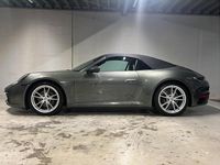 Gebraucht Porsche 911 Carrera 385 PS (283 kW) 2024 Aventuringrünmetallic Cabrio