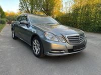 Second-hand Mercedes E200 136 CP (100 kW) 2011 Argintiu Berlinǎ