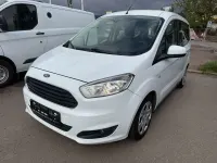 Gebraucht Ford Tourneo Courier Trend 101 PS (74 kW) 2015 Frostweiß Van / Kleinbus