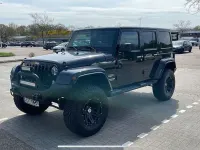 Gebraucht Jeep Wrangler Unlimited Sahara 200 PS (147 kW) 2014 Schwarz SUV