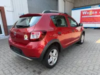 Gebraucht Dacia Sandero Prestige 90 PS (66 kW) 2015 Orange Limousine
