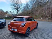 Gebraucht Suzuki Swift Comfort+ 83 PS (61 kW) 2026 Flame orange met Kleinwagen