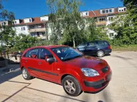 Używany Kia Rio 96 KM (70 kW) 2009 Czerwony Sedan/Limuzyna