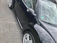 Gebraucht VW New Beetle 105 PS (77 kW) 2009 Schwarz Kleinwagen