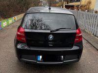 Używany BMW 118 Performance 143 KM (105 kW) 2011 Czarny Hatchback