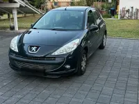 Gebraucht Peugeot 206 60 PS (44 kW) 2012 Grau Limousine