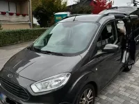 Gebraucht Ford Tourneo Courier Trend 101 PS (74 kW) 2018 Grau Van / Kleinbus