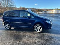 Second-hand VW Touran Highline 170 CP (125 kW) 2007 Albastru Monovolum