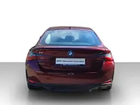 Gebraucht BMW i4 250 kW (340 PS) 2024 Aventurinrot metallic Limousine